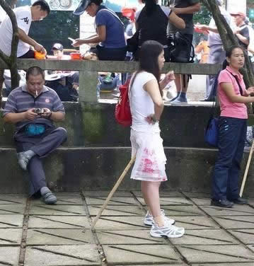 girl-sitting-on-the-Stick